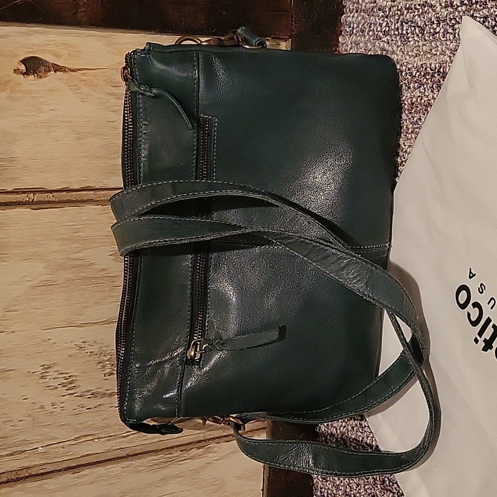 Teal latico yuma leather crossbody in new condition